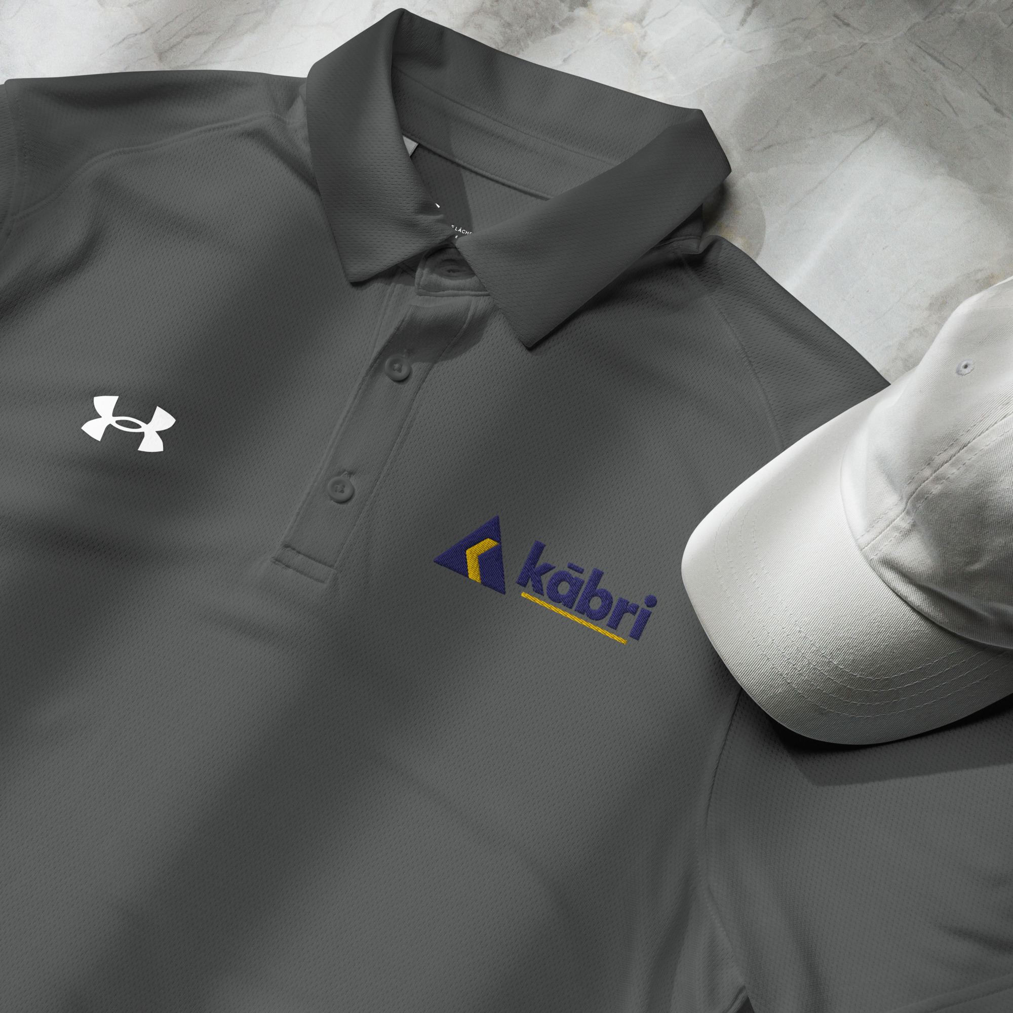 Kābri Under Armour® men's polo